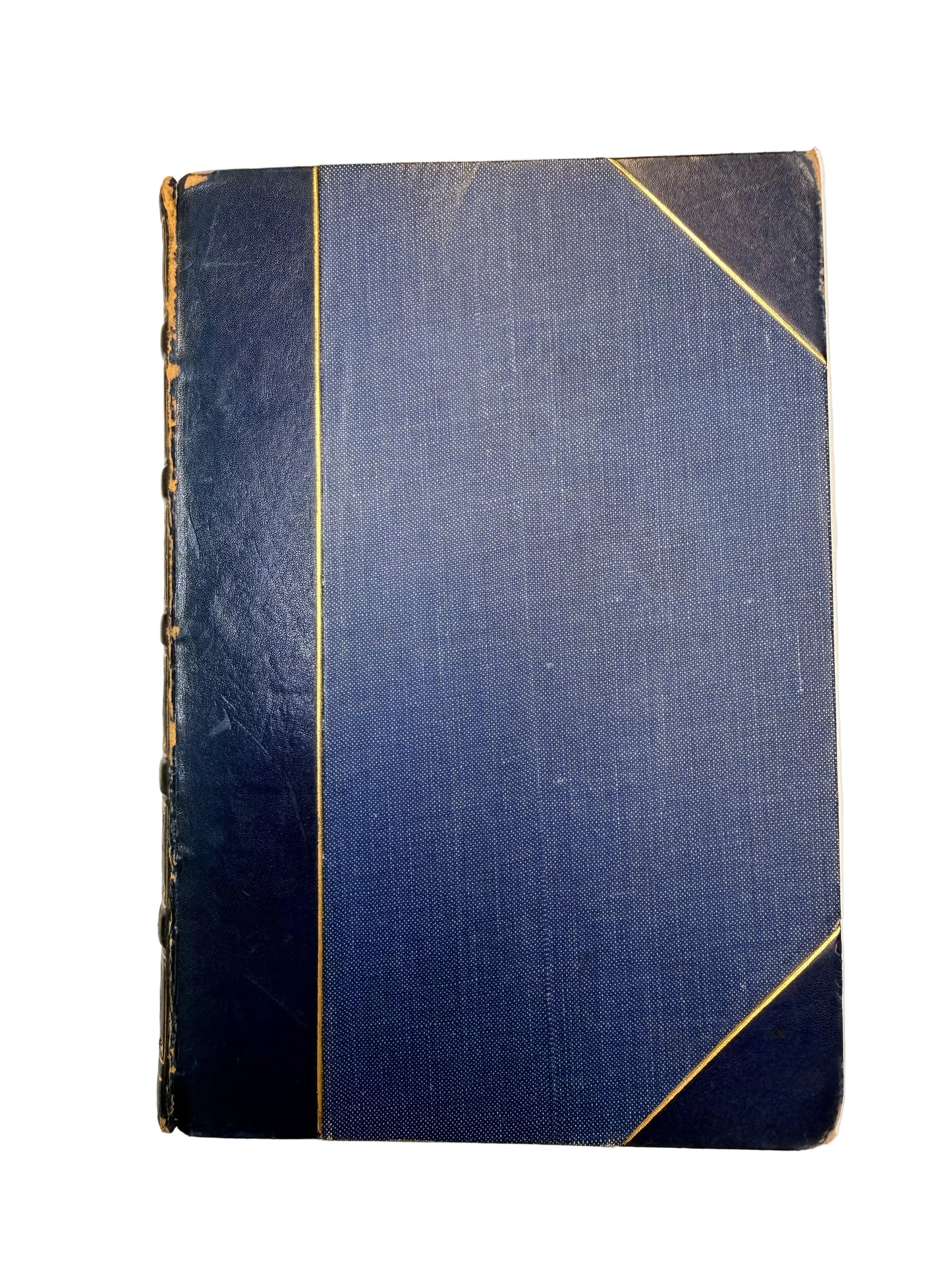 Vintage blue book with gold corners on a white background