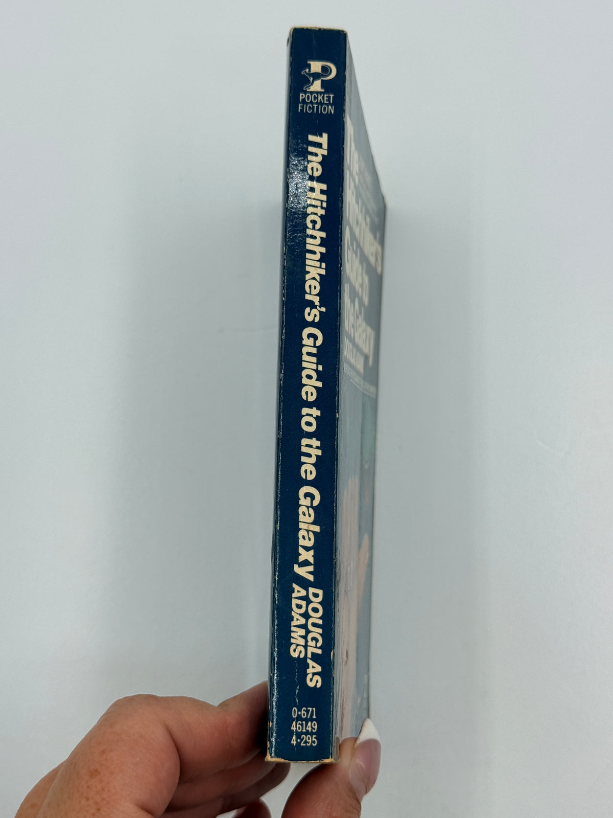 The Hitchhiker’s Guide to the Galaxy by Douglas Adams, paperback