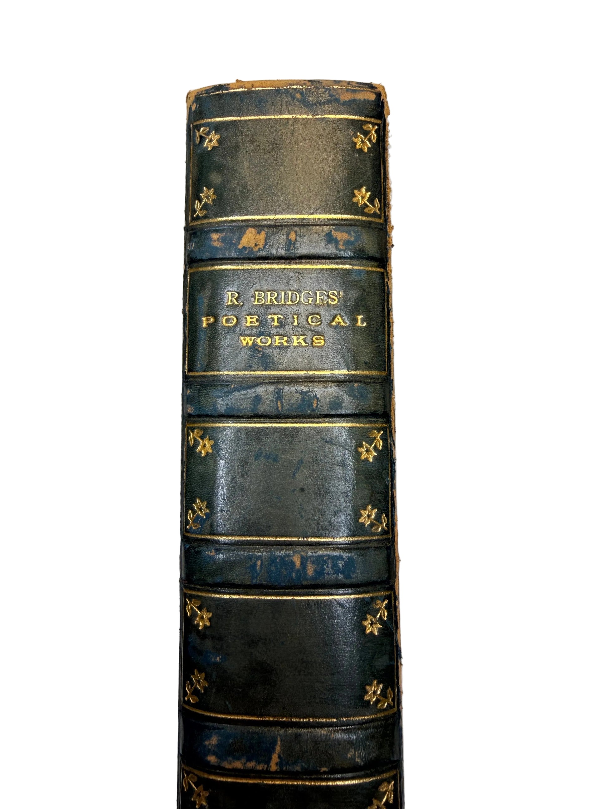 Vintage book with decorative spine on a plain background