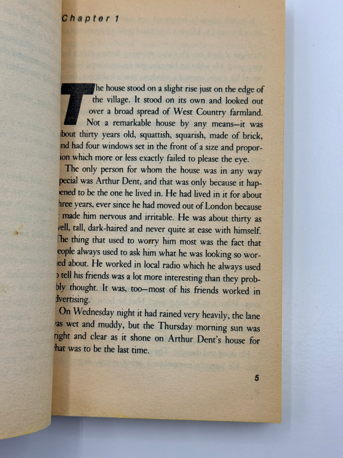 The Hitchhiker’s Guide to the Galaxy by Douglas Adams, paperback