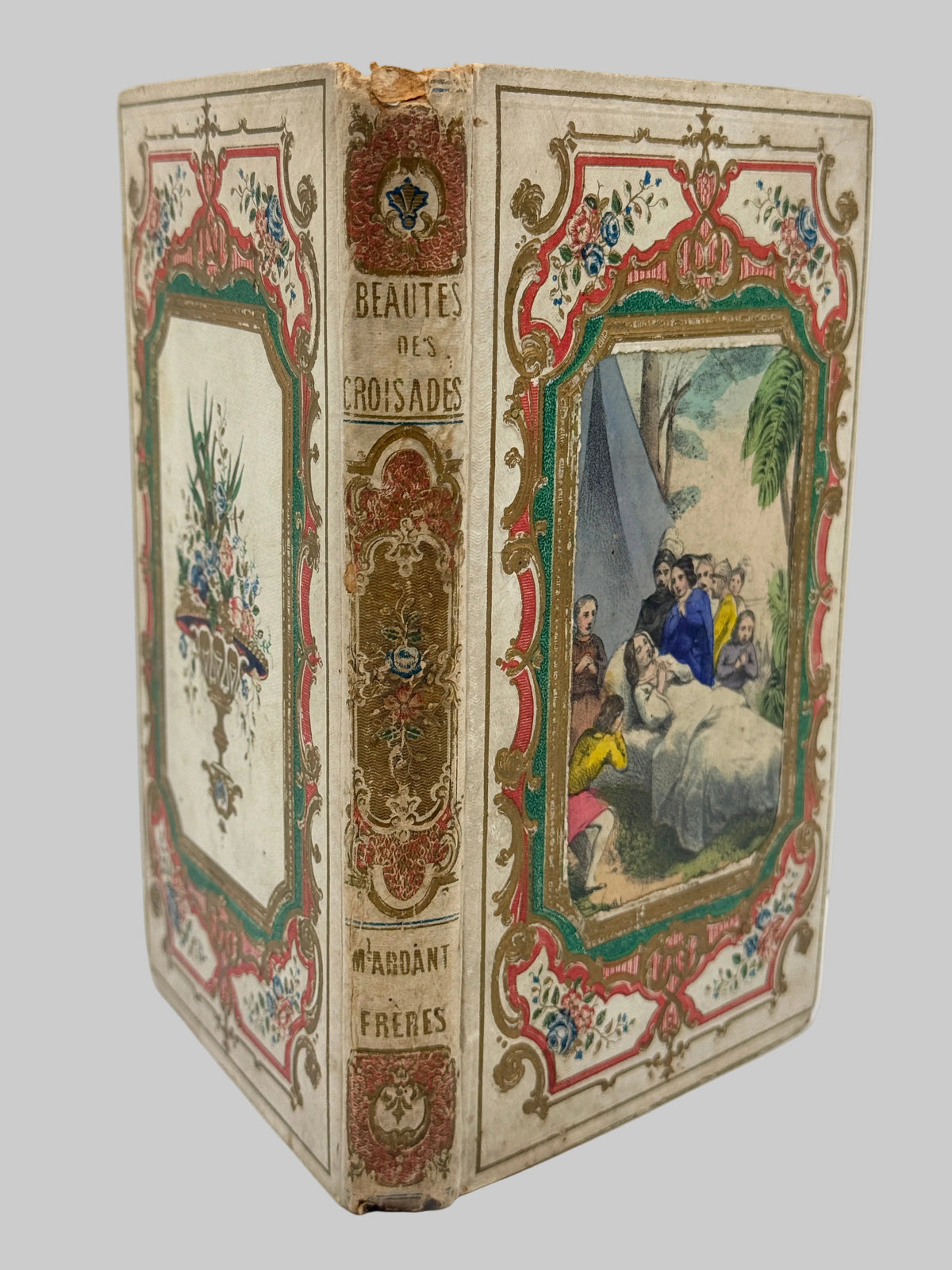 An antique French book titled 'Beautés des Prosaïstes' by 'Madame Frères', featuring ornate vintage cover and spine illustrations with floral borders and a central painted scene.