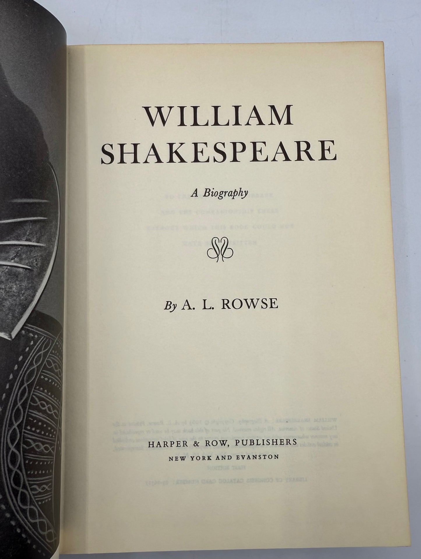 Title page of 'William Shakespeare: A Biography' by A. L. Rowse with a gray background.