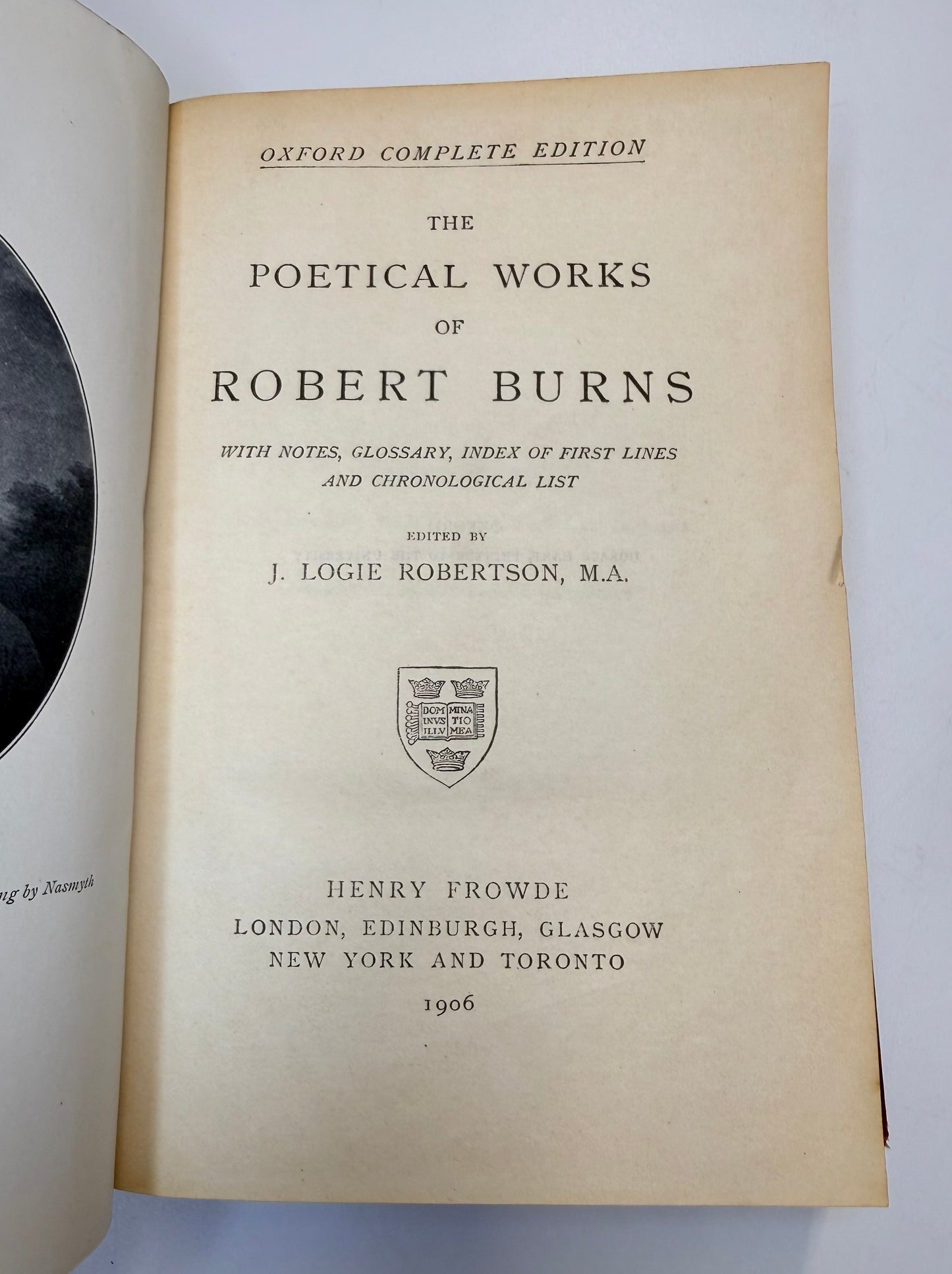 Title page of 'The Poetical Works of Robert Burns' with publisher information.