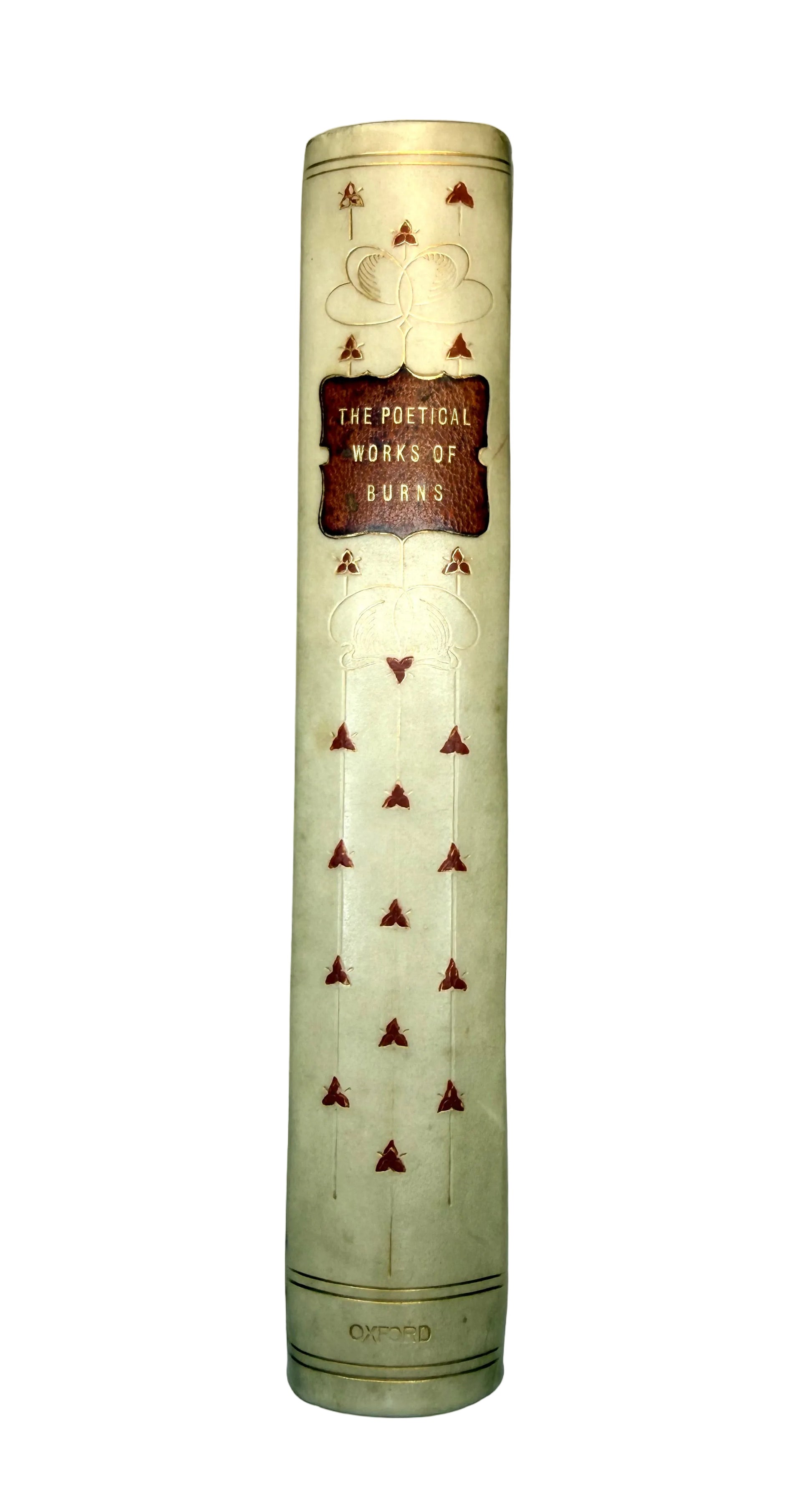 Tall cylindrical book with decorative cover on a light gray background