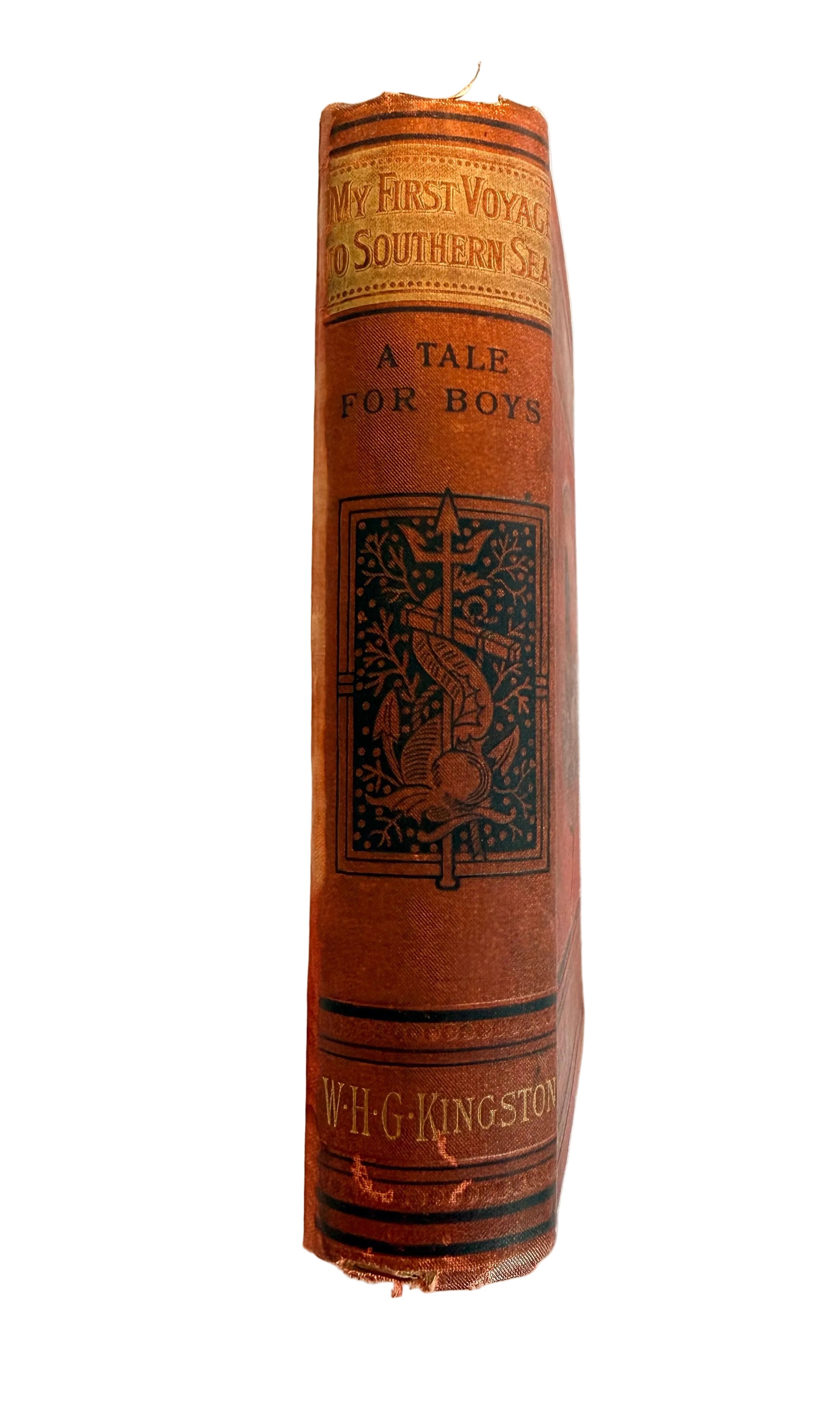 Vintage book titled 'My First Voyage to the Southern Seas' on a white fabric background