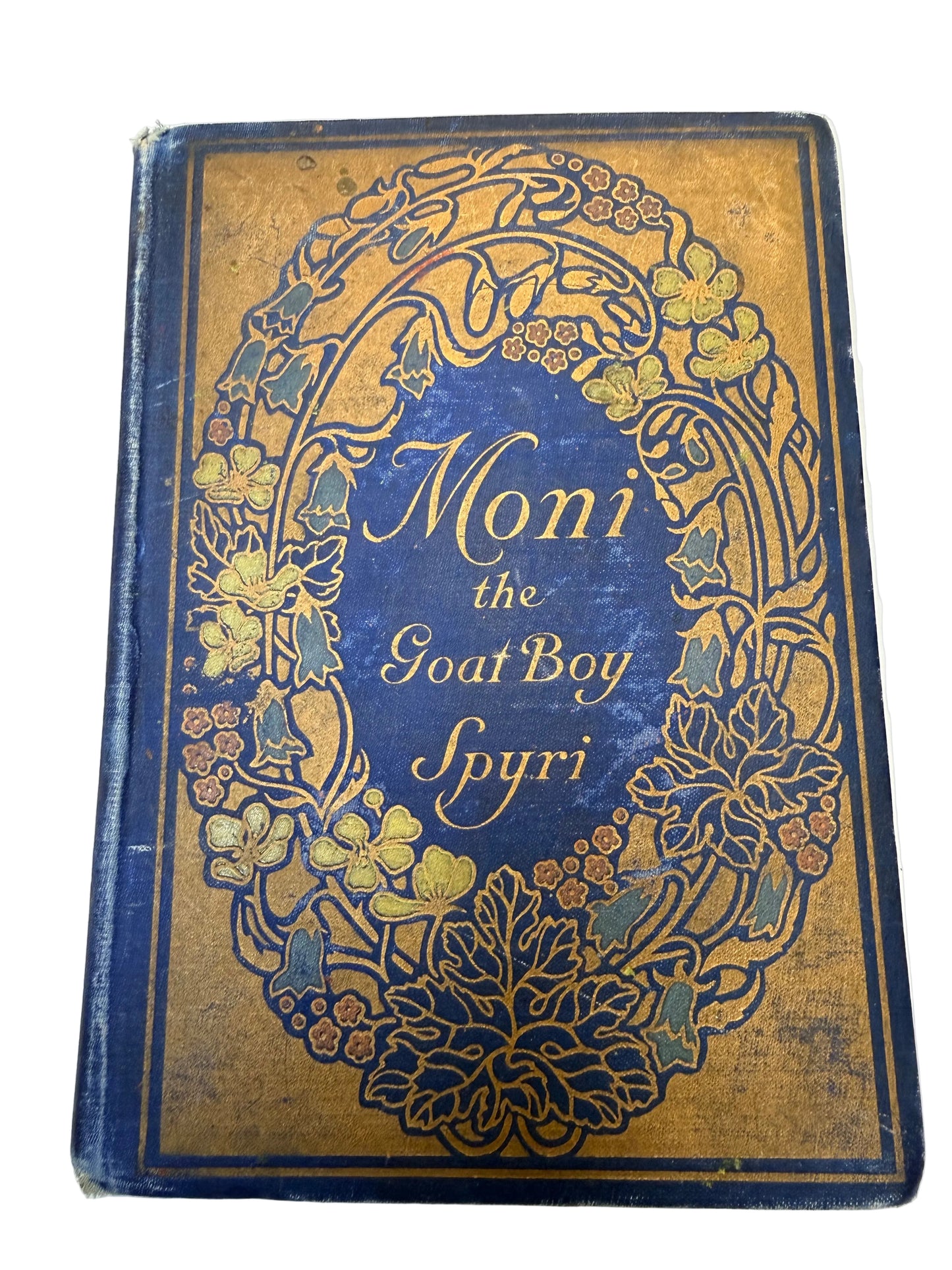 Decorative book cover with gold and blue design on a white background