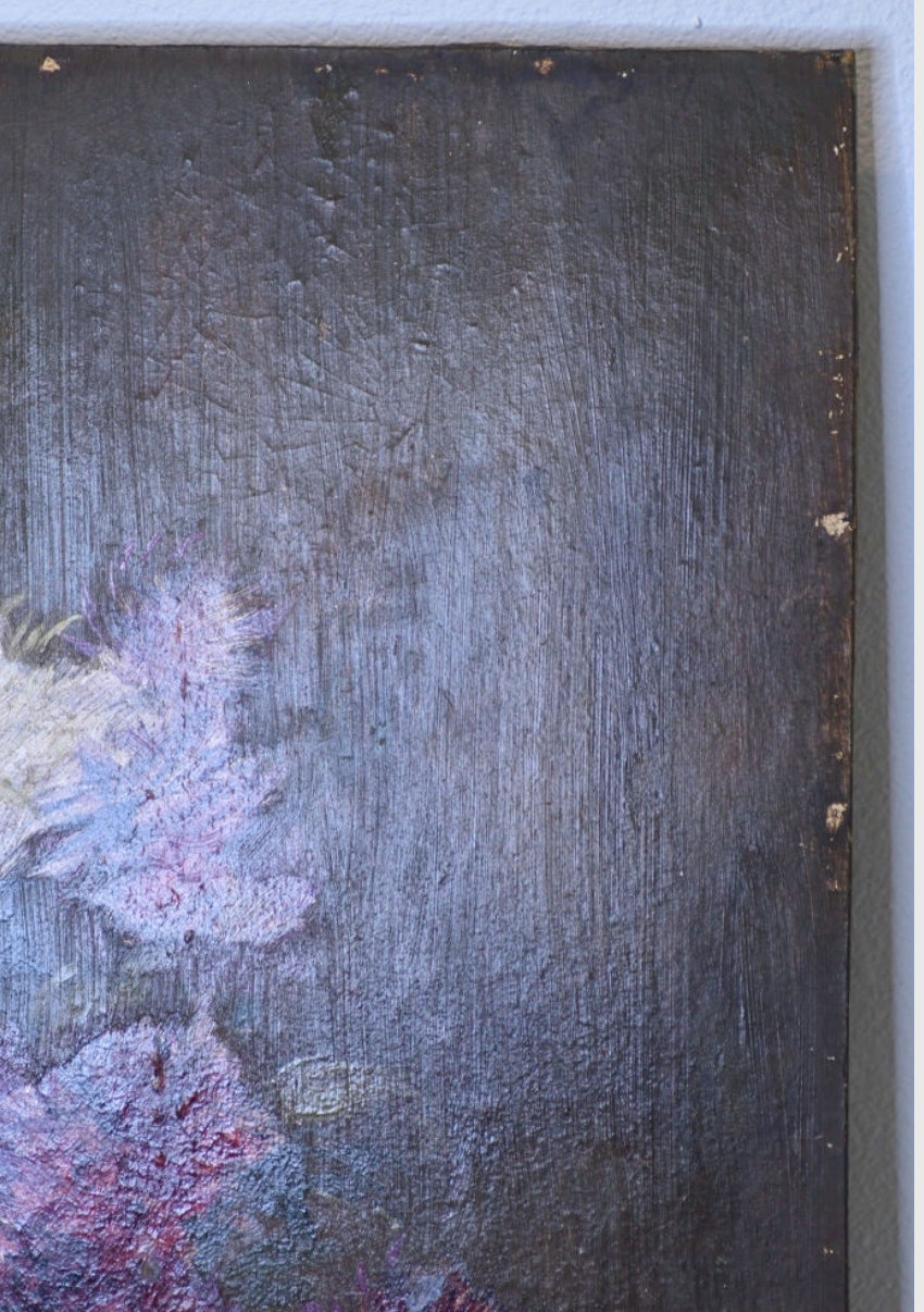 Abstract painting with pink and purple hues on a dark background