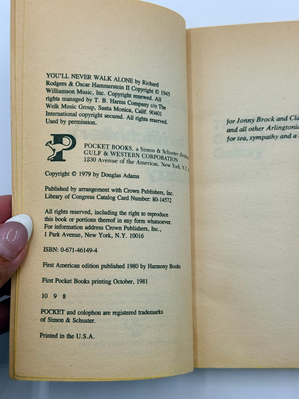 The Hitchhiker’s Guide to the Galaxy by Douglas Adams, paperback