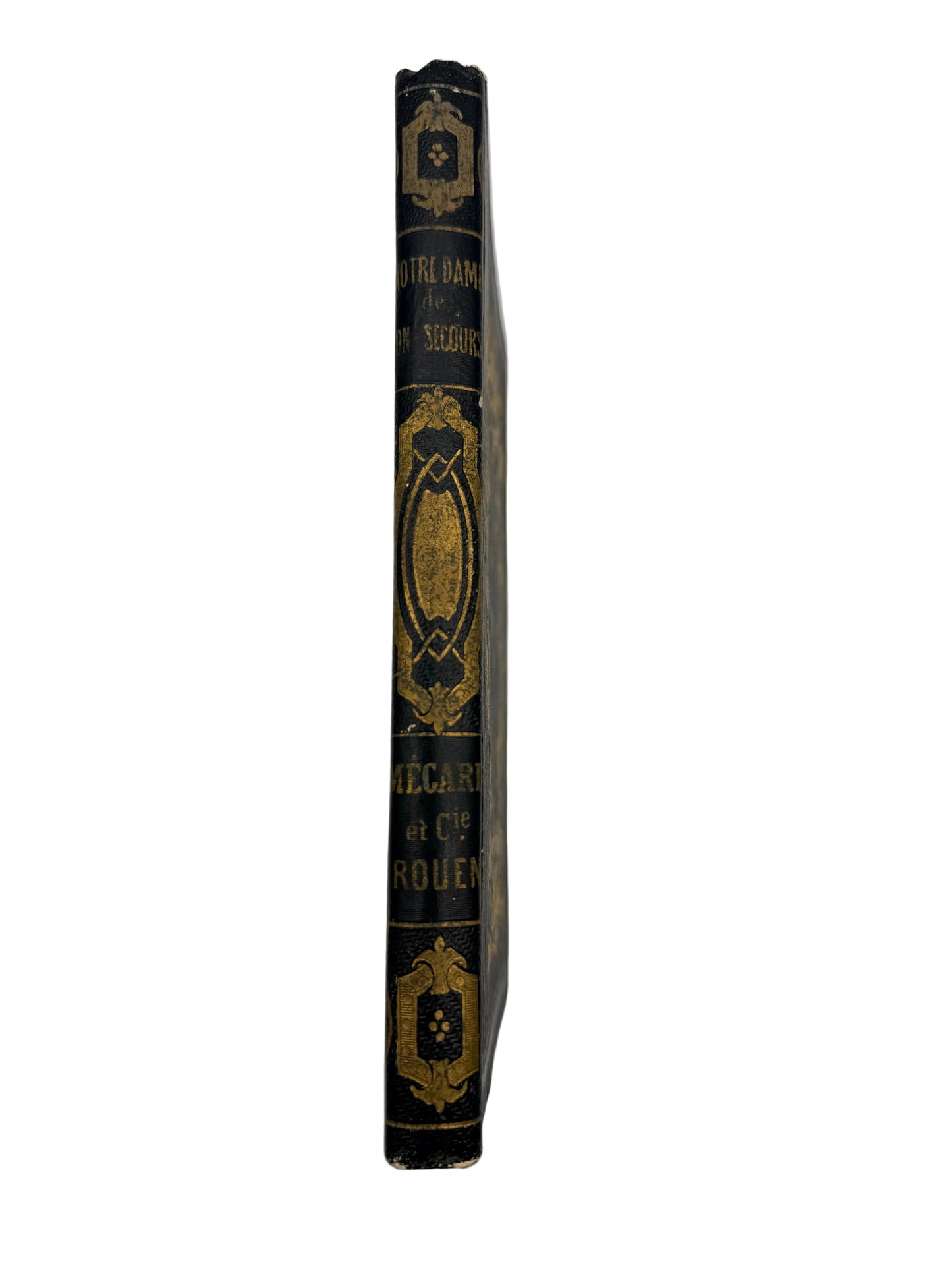 Vintage book with decorative spine on a white background