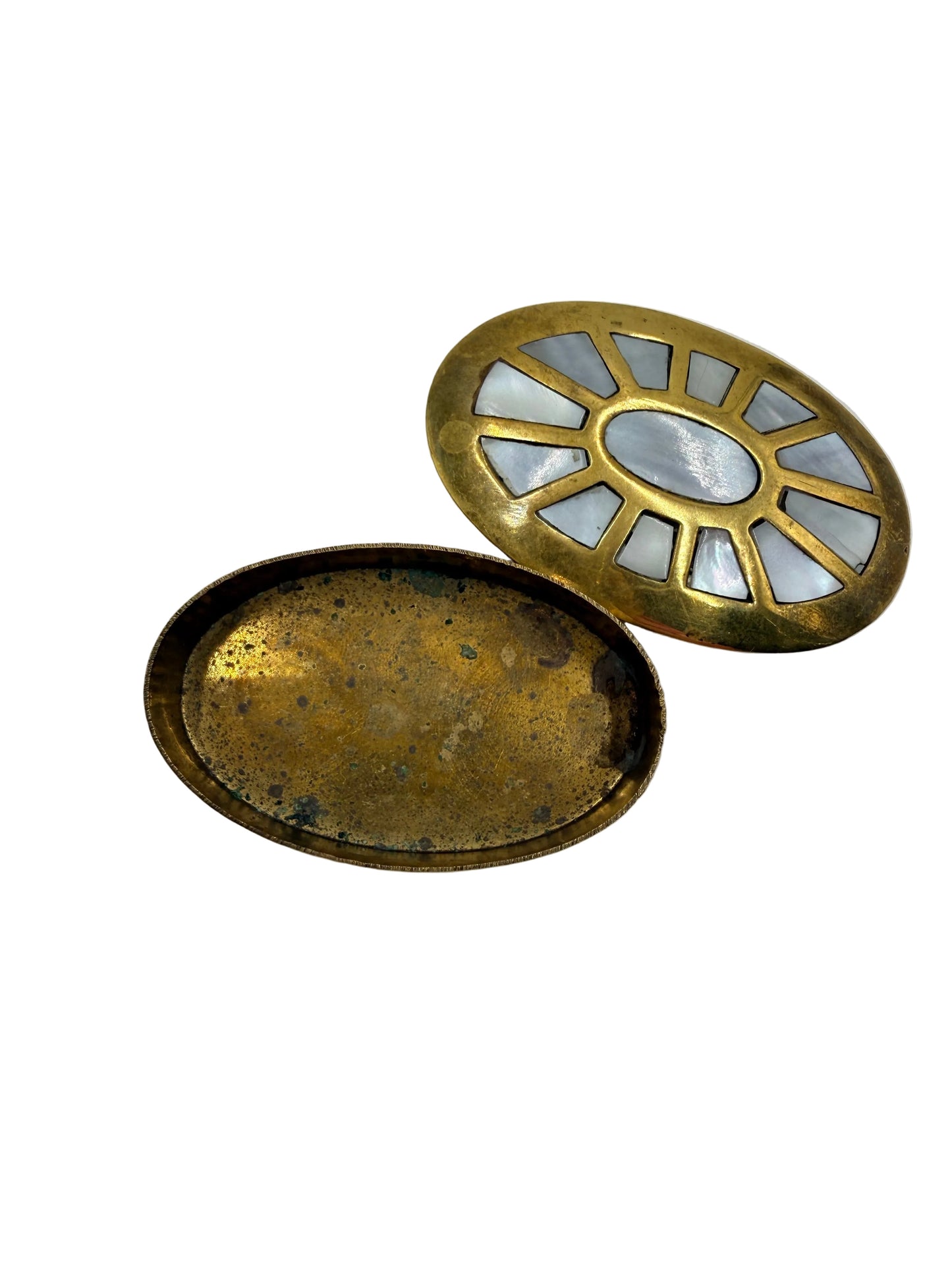 Two brass decorative items on a white background