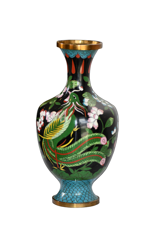 Decorative vase with peacock design on a black background