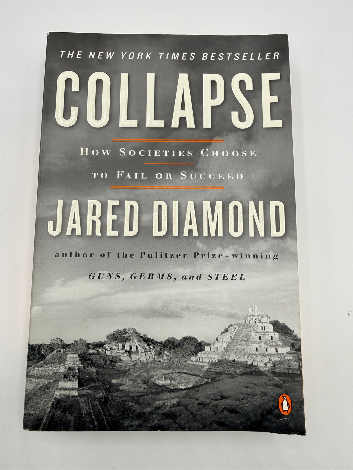 The book cover of 'Collapse' by Jared Diamond, published by Penguin, displayed flat against a light off-white background.