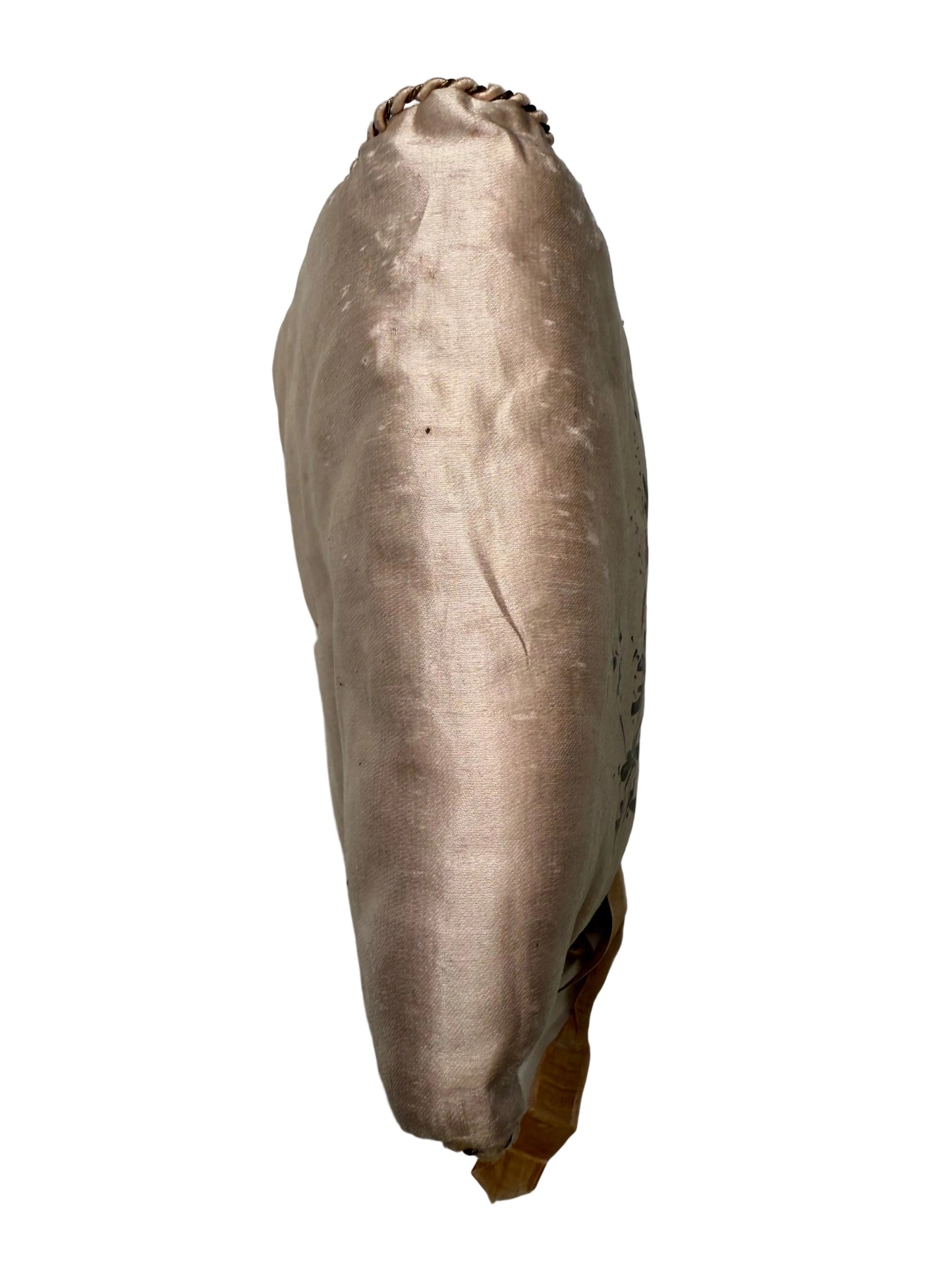 Textured cylindrical object on a light gray background