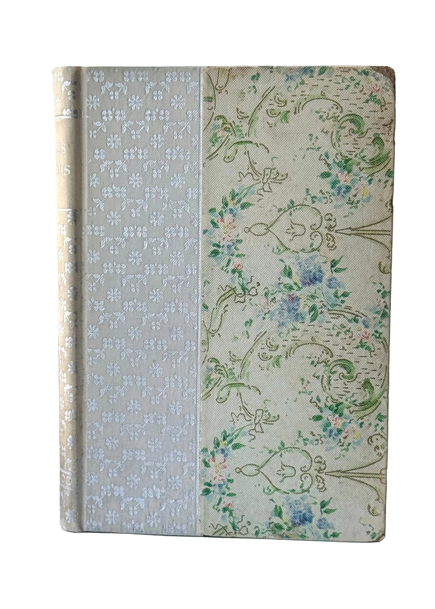 Decorative notebook with floral and geometric patterns on a light surface.