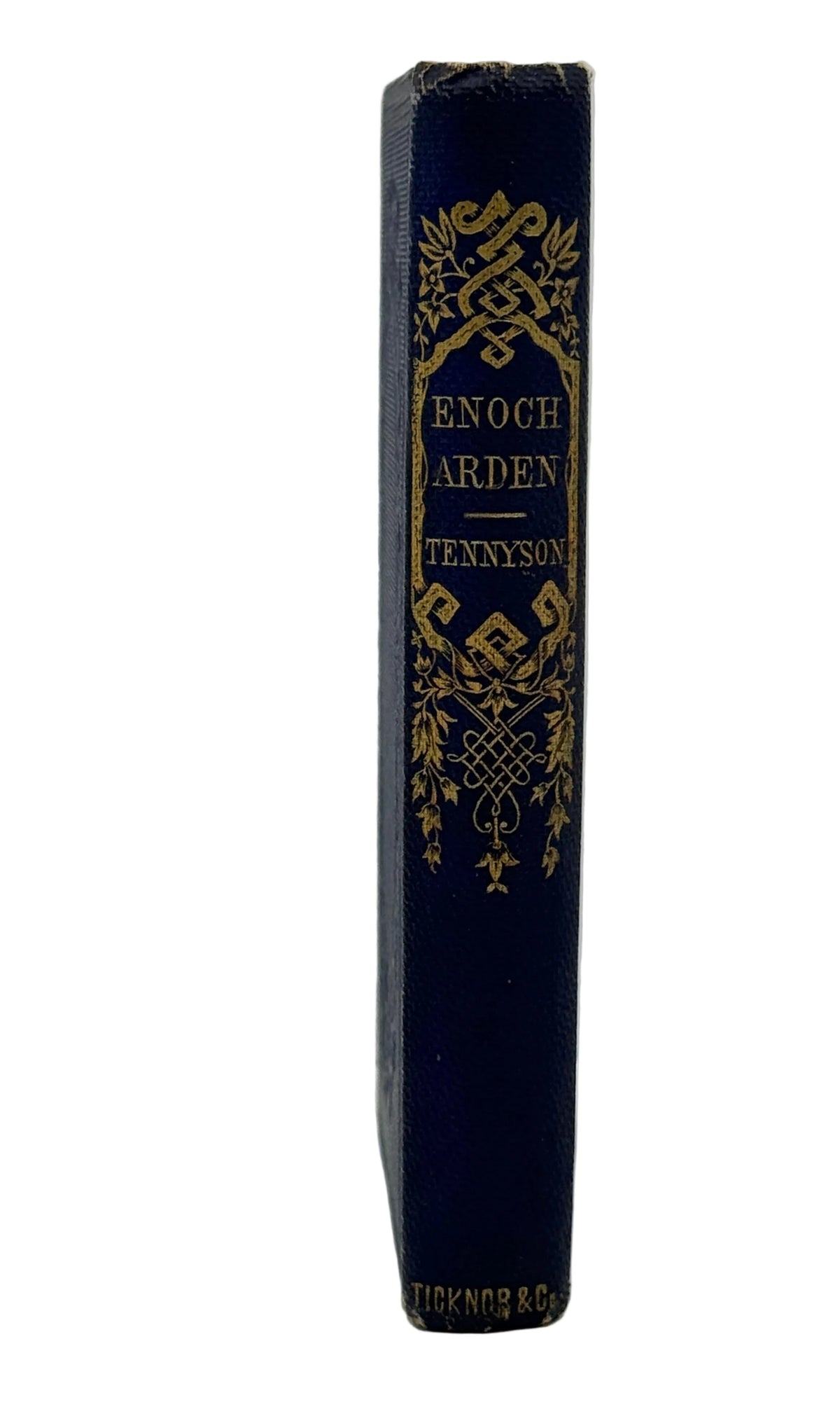 A vintage hardcover book standing upright, showing its dark blue cloth spine with ornate gold gilding and the title 'Enoch Arden' by Tennyson.