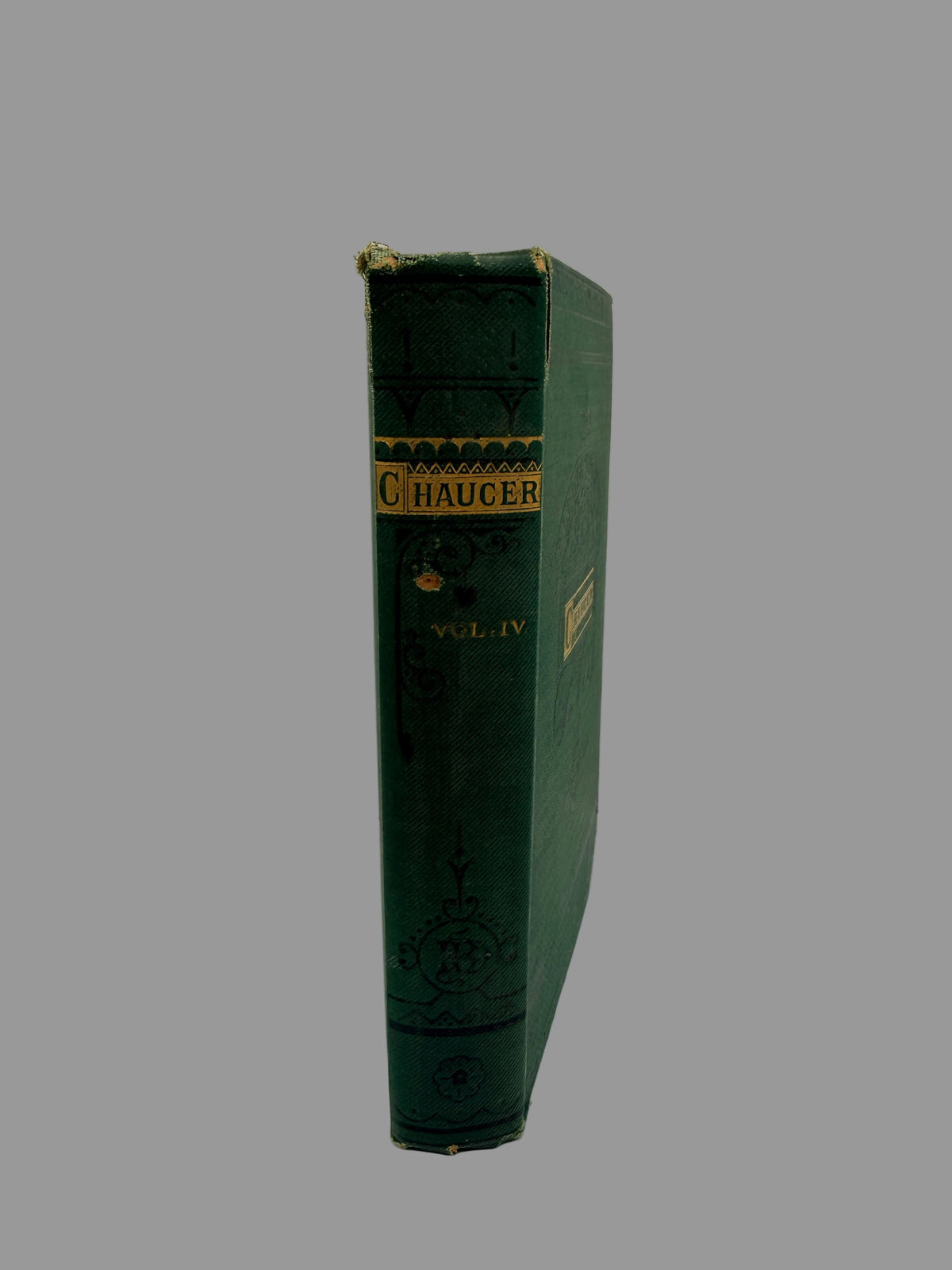 A vintage hardcover book standing upright, showing its green cloth-bound spine with gold lettering that reads 'Chaucer' and 'Vol. IV'.