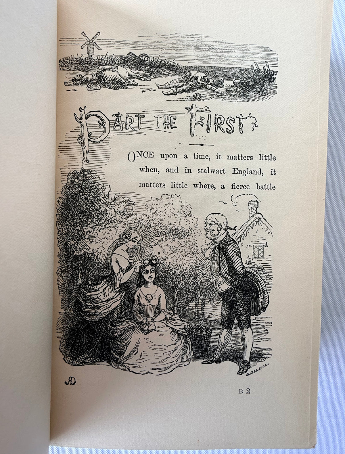 An open vintage book or magazine showing a black-and-white engraved illustration and the title 'Part the First' on aged cream paper, photographed against a light neutral background.