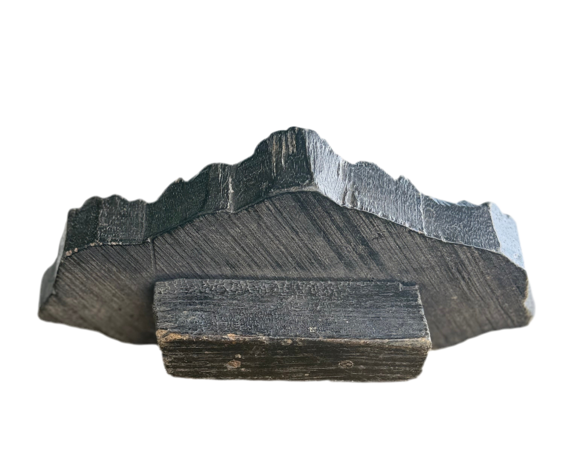 Stack of black stone slabs on a white background