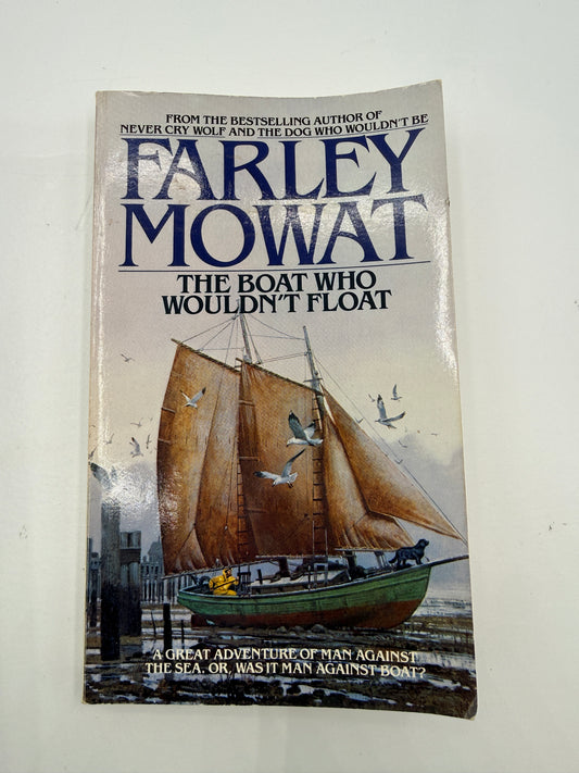 The front cover of the book 'The Boat Who Wouldn't Float' by Farley Mowat, featuring an illustration of a sailboat on water with seagulls flying around it. The author's name is printed in large blue letters at the top.