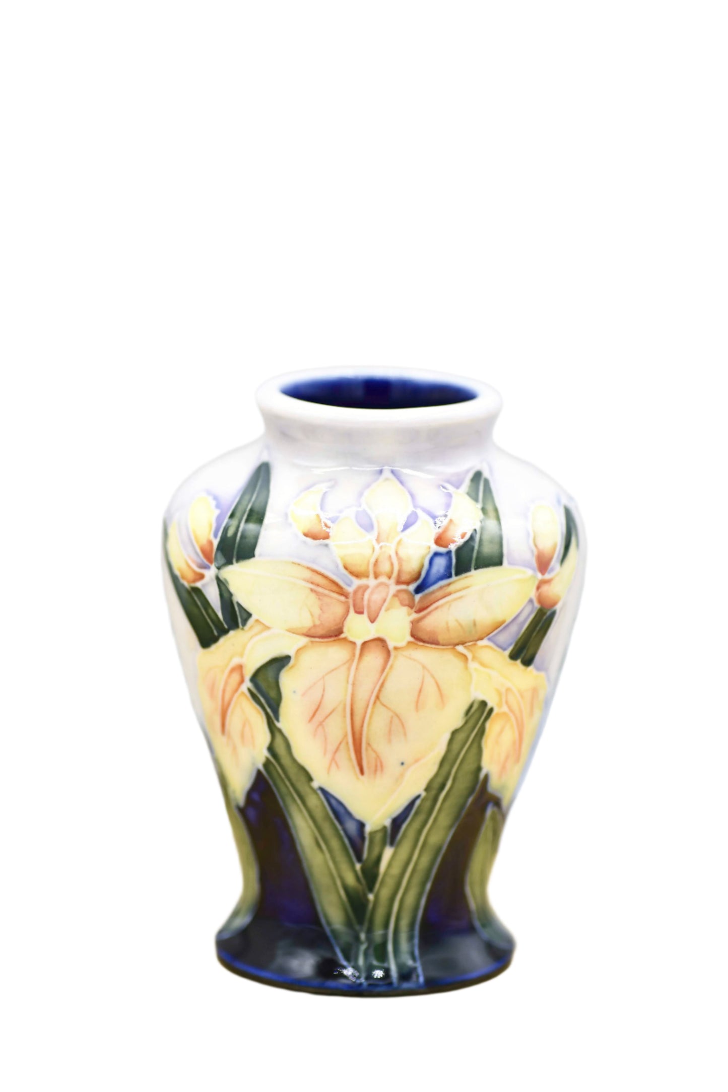 A small Moorcroft Windrush baluster vase with yellow and orange irises, green stems, and blue accents on a white background.