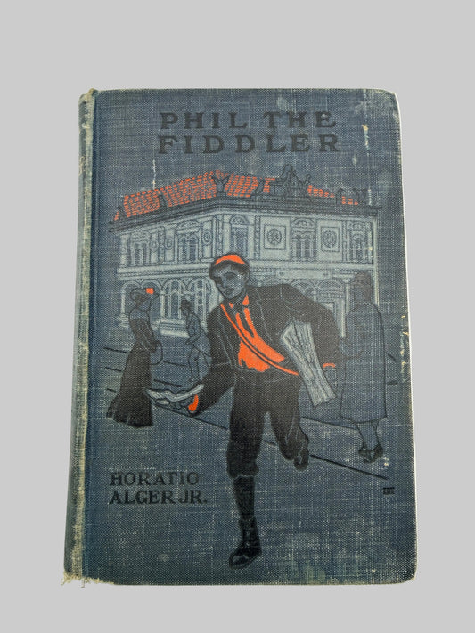 Vintage book titled 'Phil the Fiddler' by Horatio Alger Jr., featuring a dark blue illustrated cover with a fiddler in an orange vest and black pants against a building background.