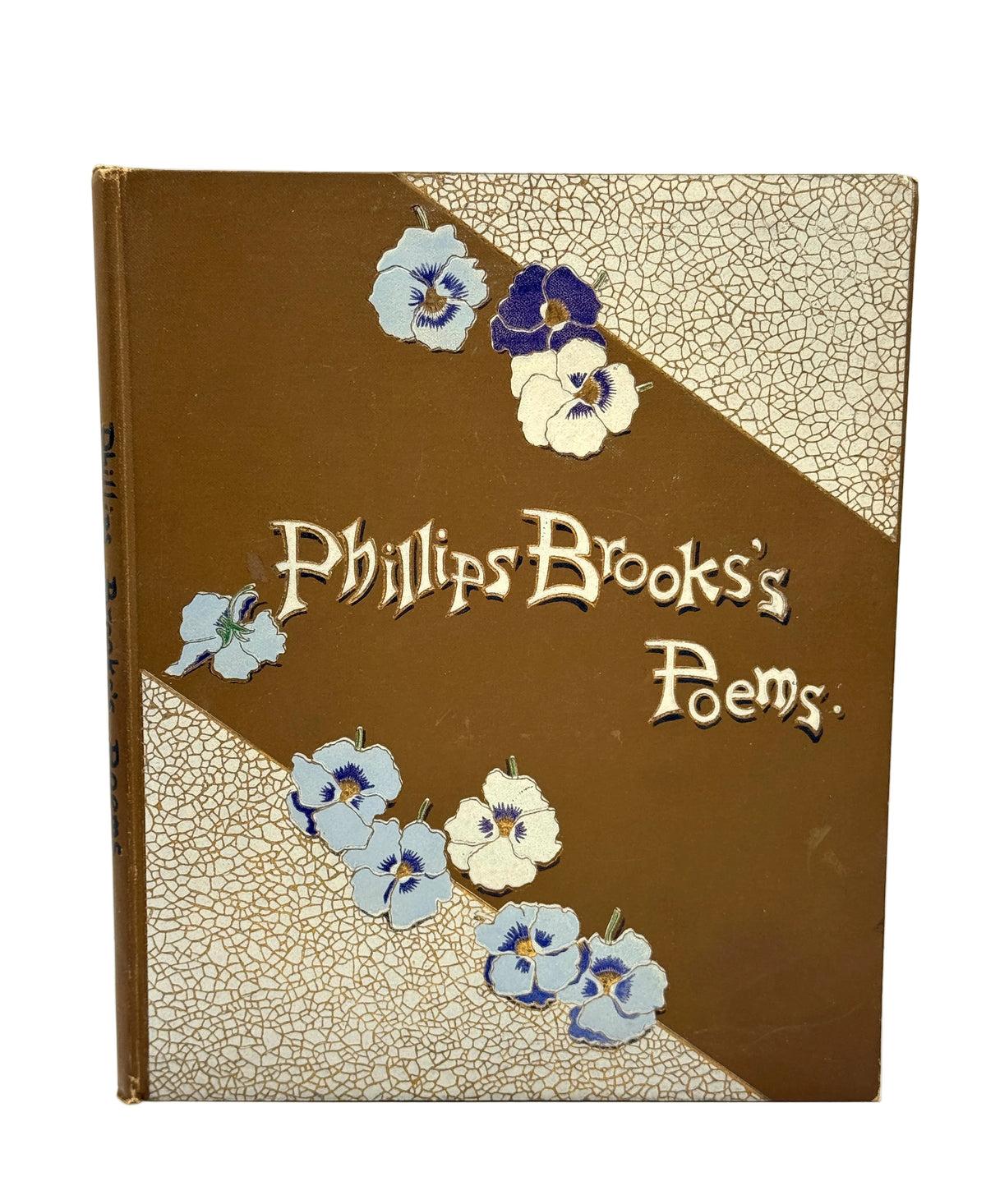 A vintage hardcover book titled 'Phillips Brooks's Poems' with a brown cover, decorative embossed floral details, and a textured beige corner design.