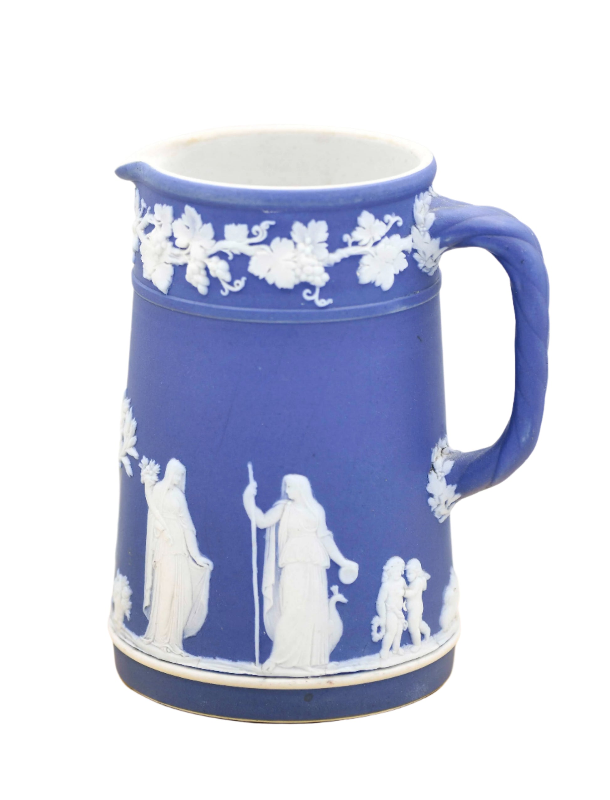 A blue and white Wedgwood ceramic pitcher with floral and botanical designs in relief.