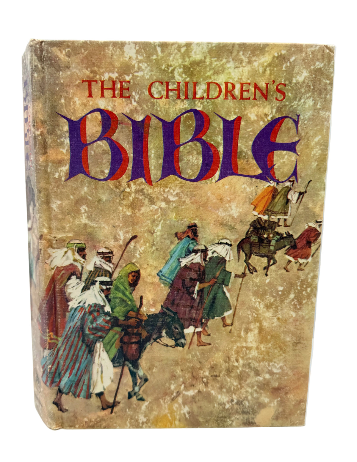 The Children's Bible book with a textured, distressed tan cover, featuring the title in red and purple lettering and an illustration of biblical figures on the front.