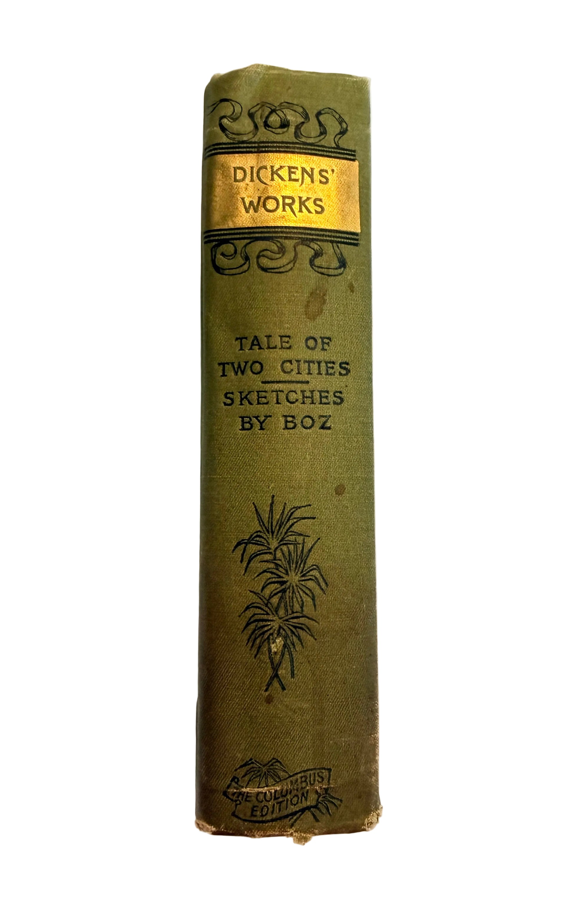 Vintage book titled 'Tale of Two Cities Sketches by Boz' by Charles Dickens on a textured white background