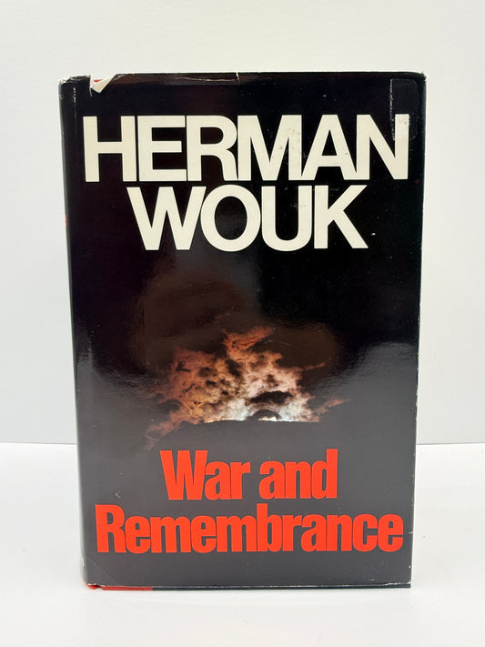 A vintage paperback book of Herman Wouk's 'War and Remembrance' with a black cover, white author name, and red title text, photographed against a plain white background.